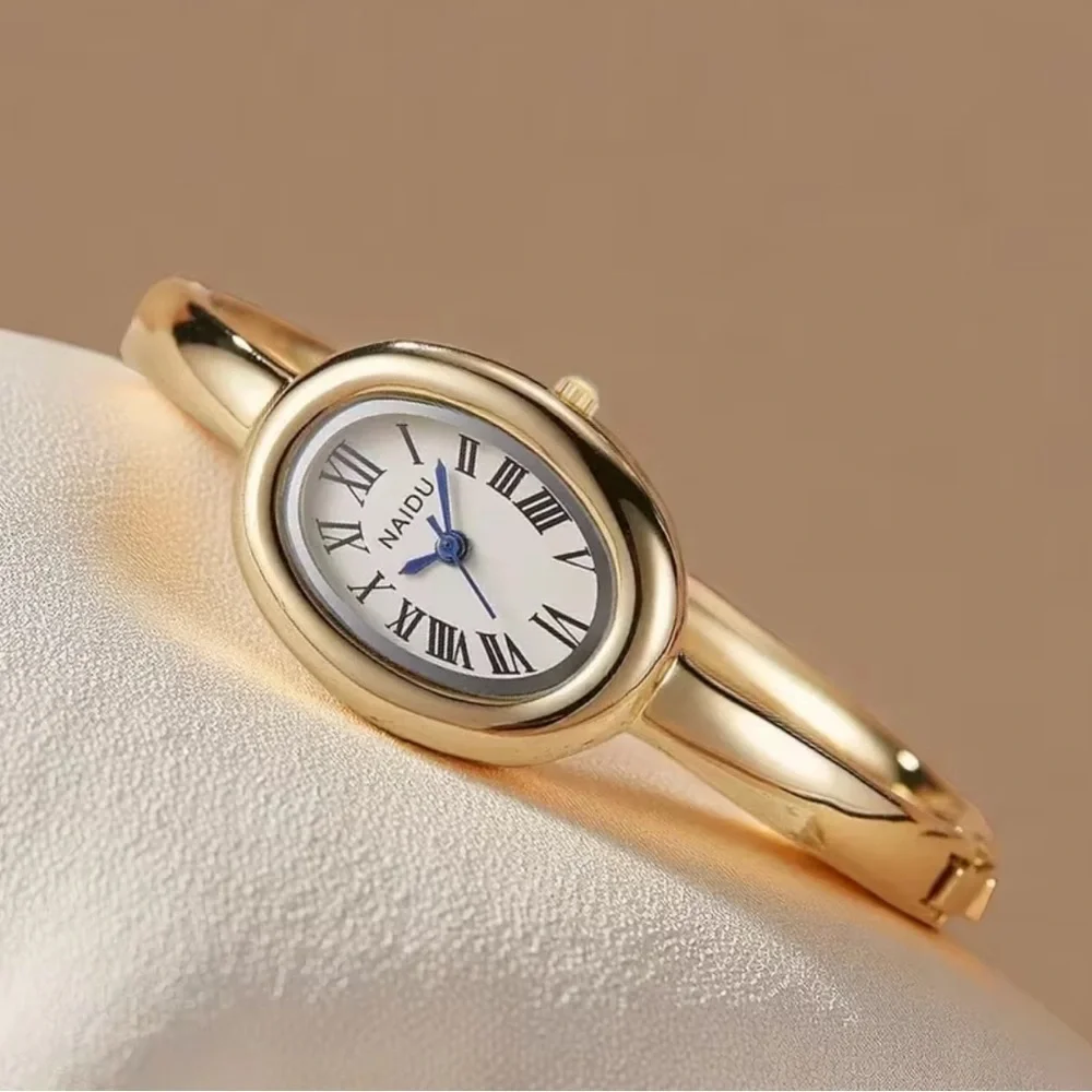 Anthropologie chic gold