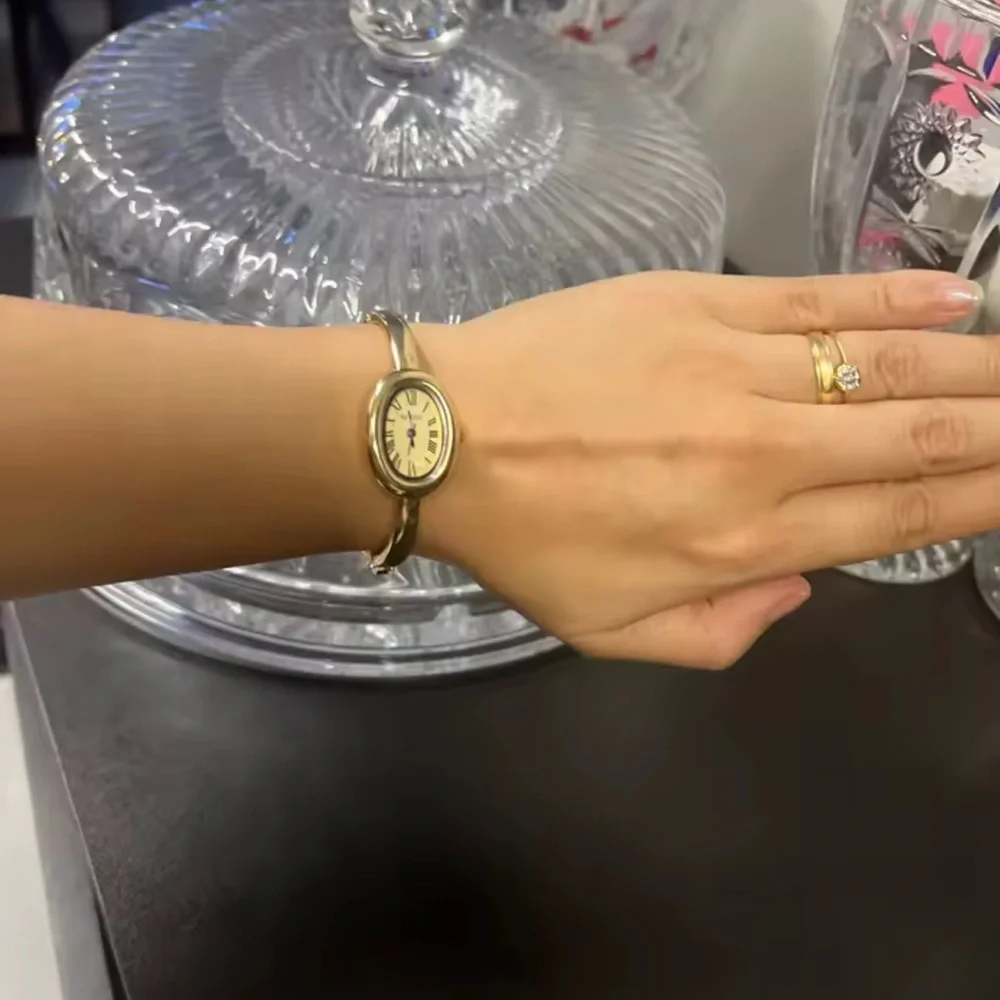 Anthropologie chic gold