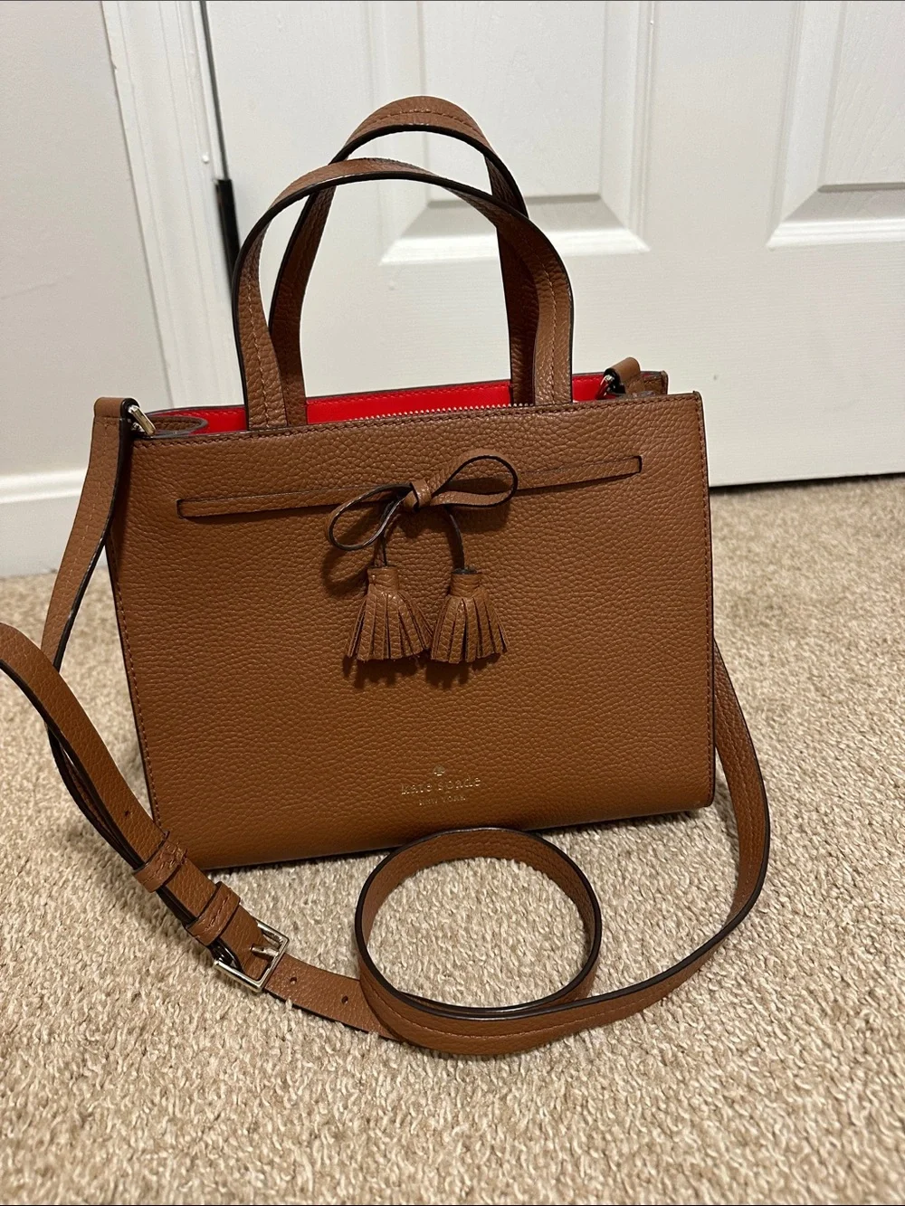 kate spade Hayes street Brown Leather Tassel Satchel with Red Lining