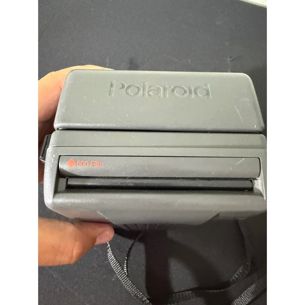 Polaroid please see