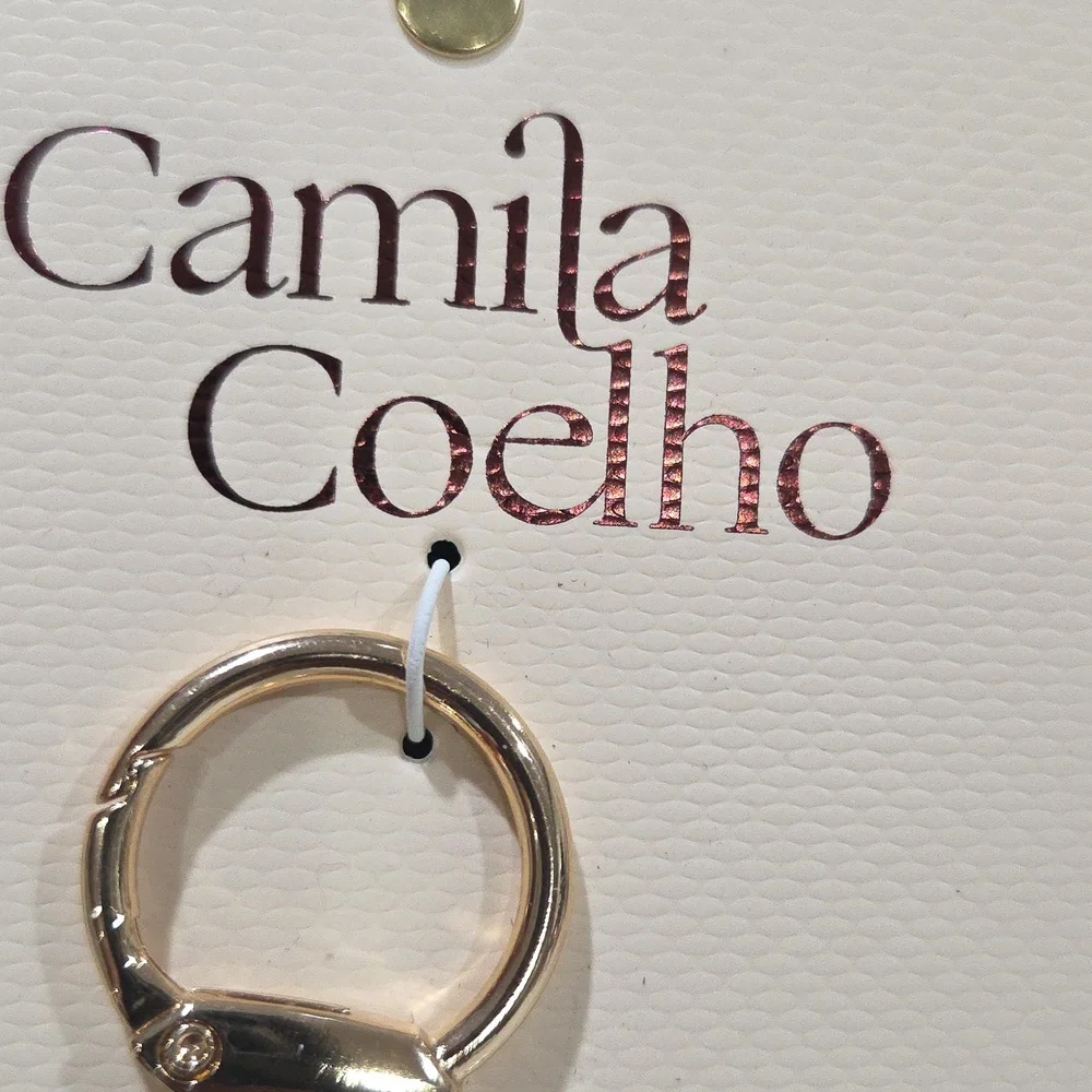 Camila Coelho chic leather