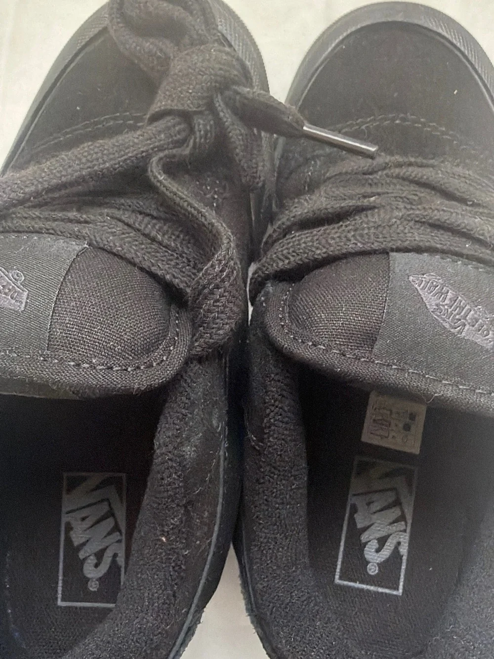 Vans all black