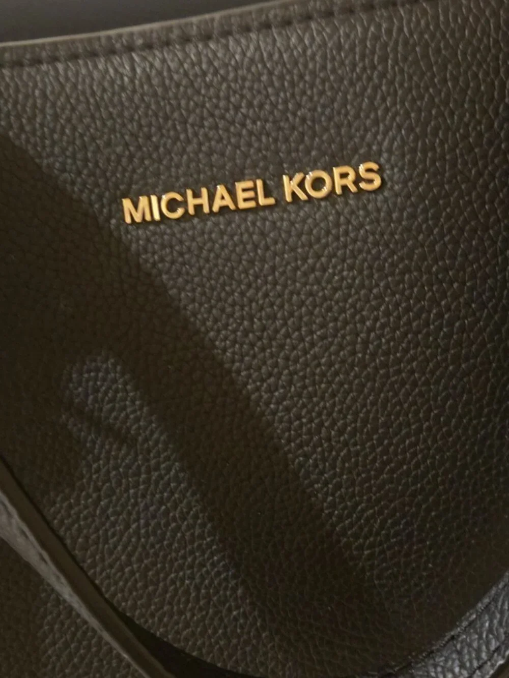Michael Kors imported dust