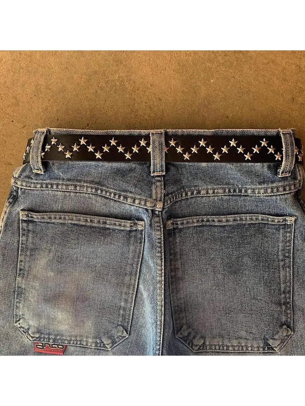 Western star studded black belt. 38.5 inches length. 1.5 inch width. Fits a