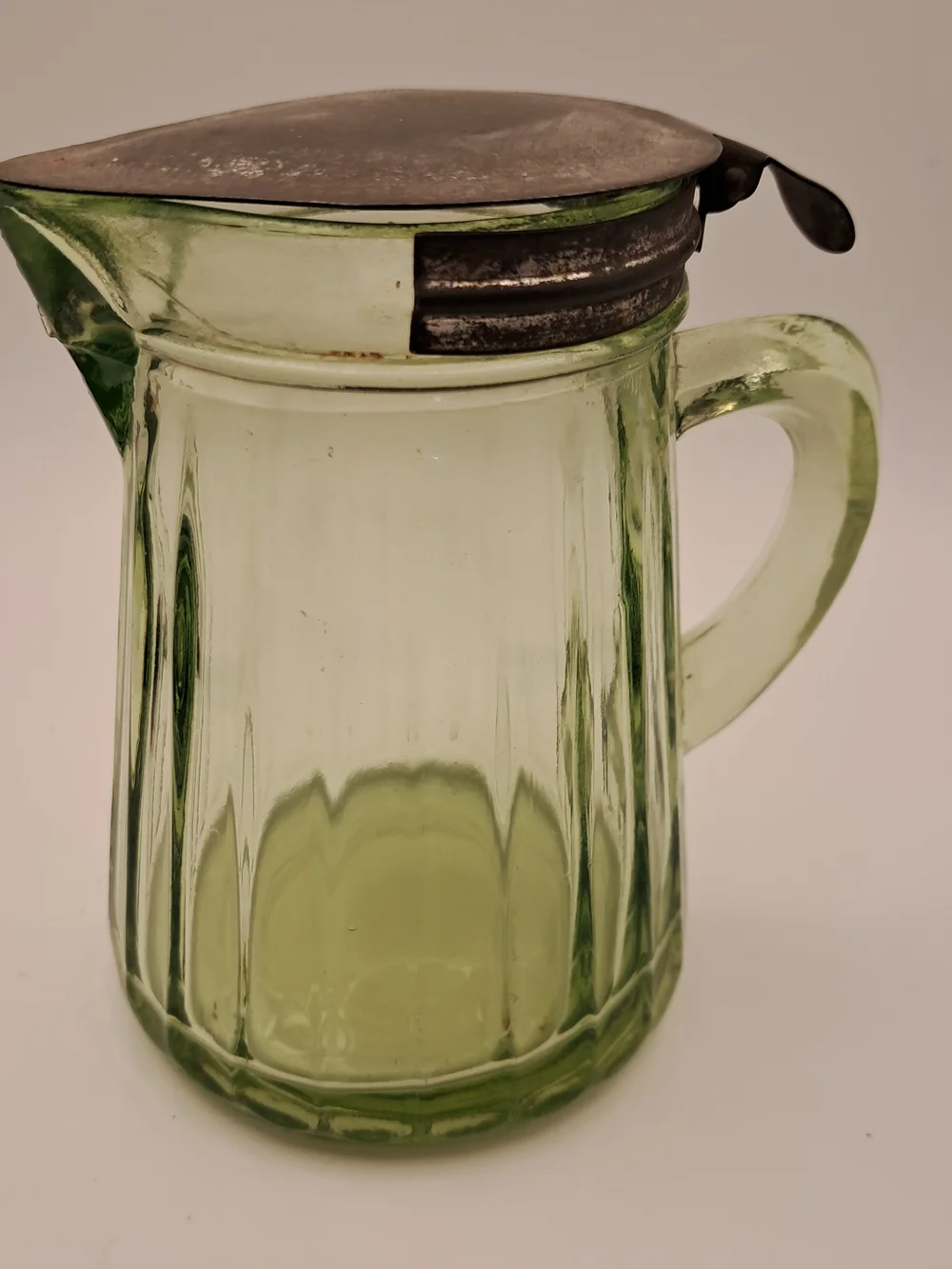 ​Vintage Green Uranium Glass Syrup Pitcher Metal Flip Top Lid Glows Ribbed 4.5