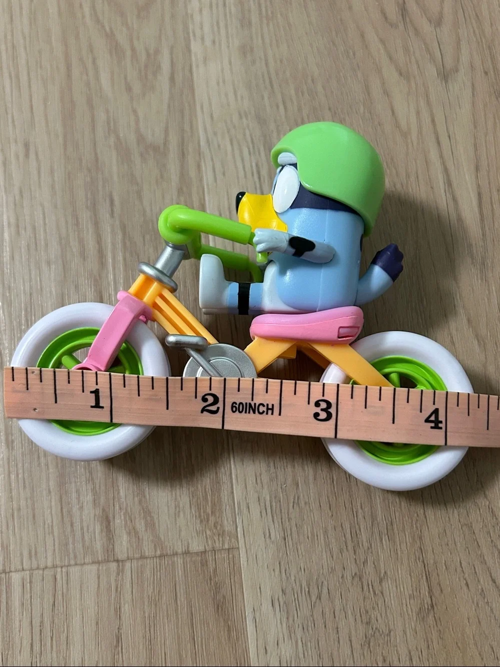 Bluey bike figure