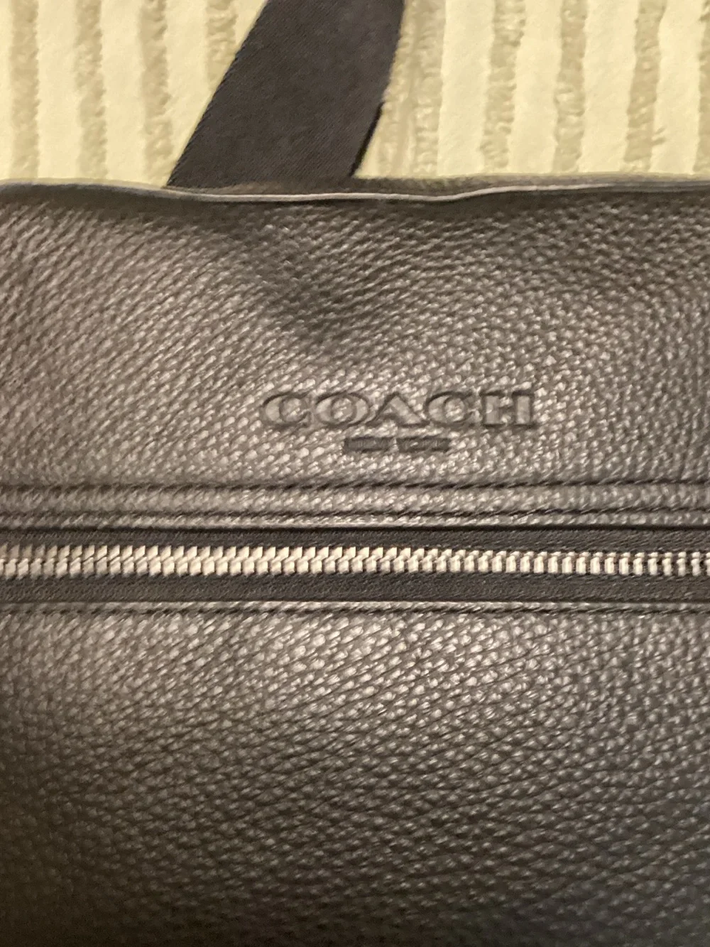 Coach compact pebbled