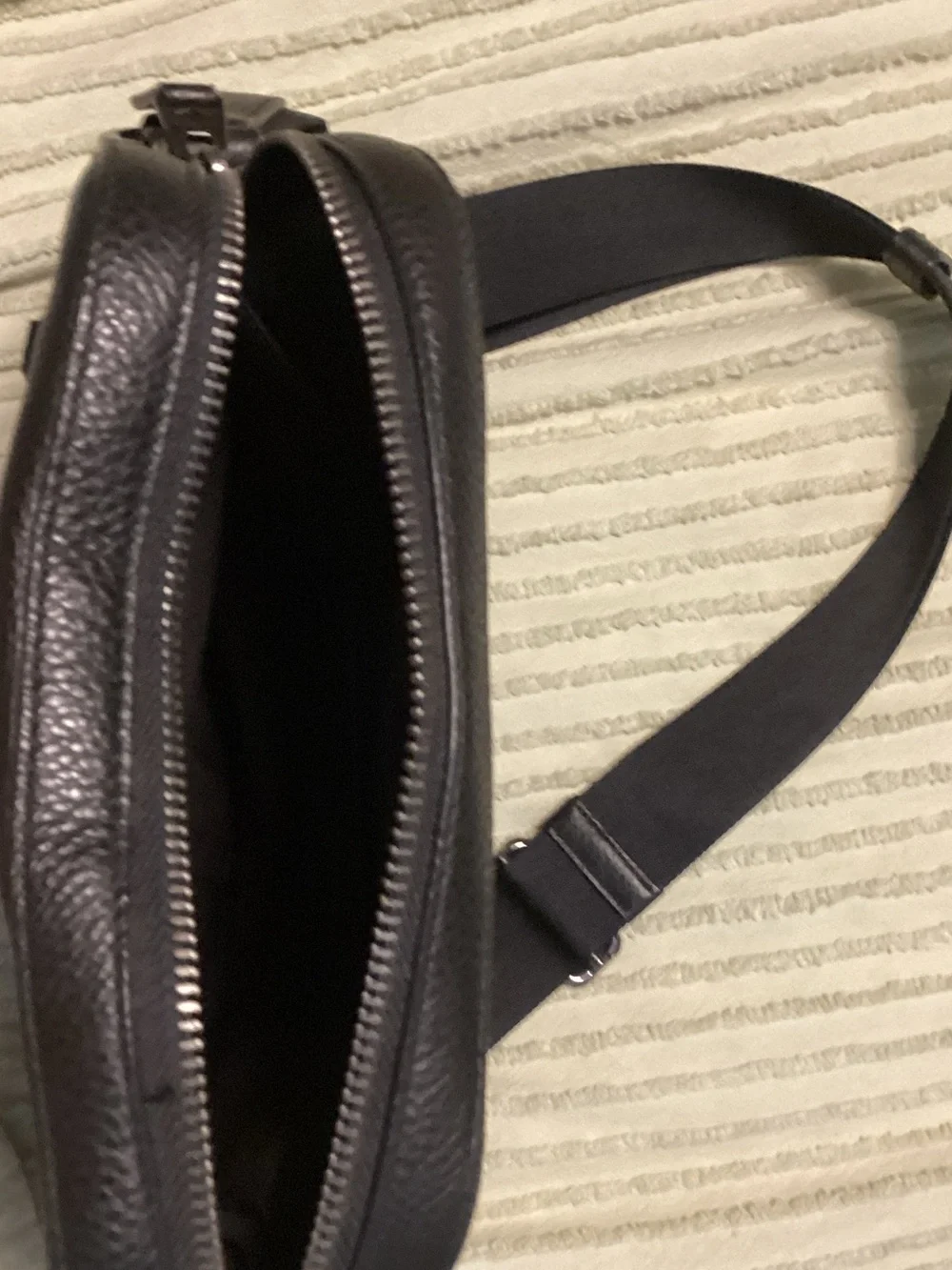 Coach compact pebbled