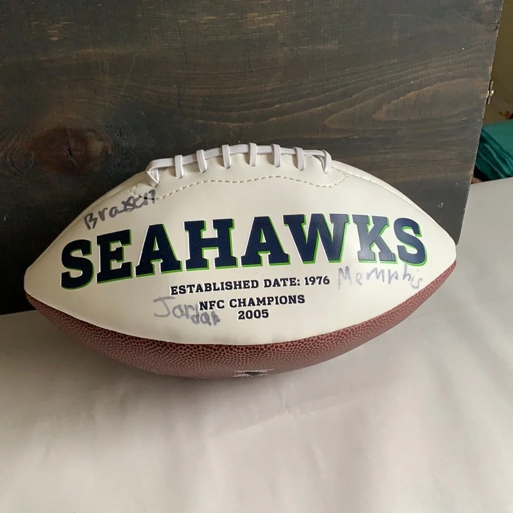 2005 NFC Champions Seahawks football with signatures read below