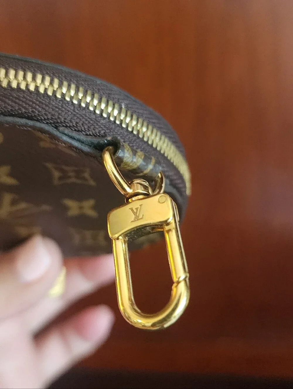 Authenic Louis Vuitton Brown Monogram Round Coin Purse with Gold Hardware