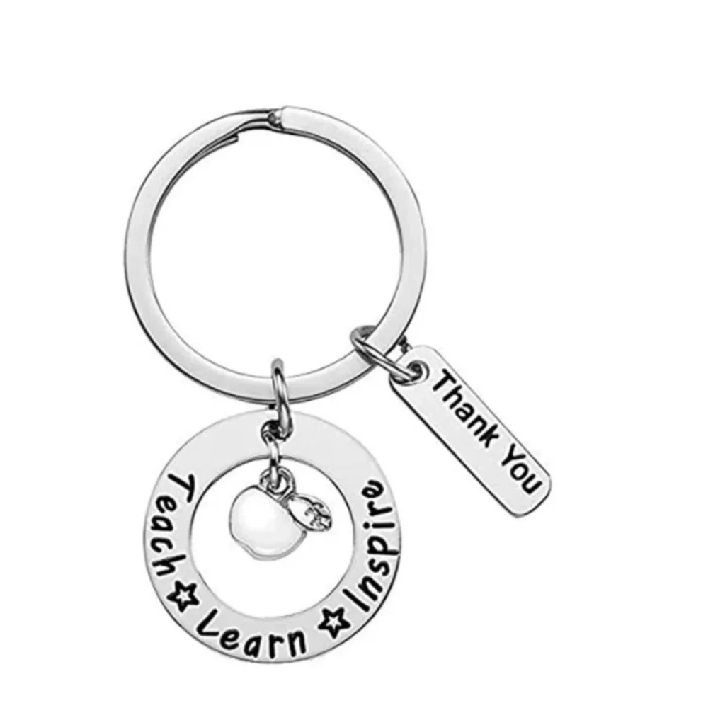 Infinity Teacher silver keychain never used