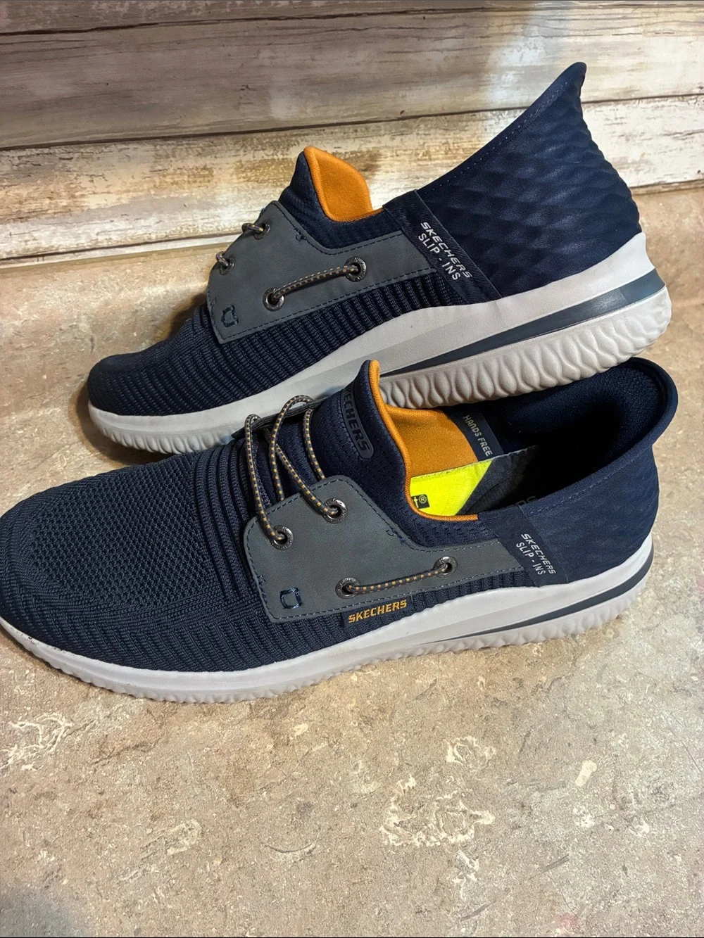 Skechers Men's Size 12 Navy Knit Slip-On Sneakers with Orange Liner
