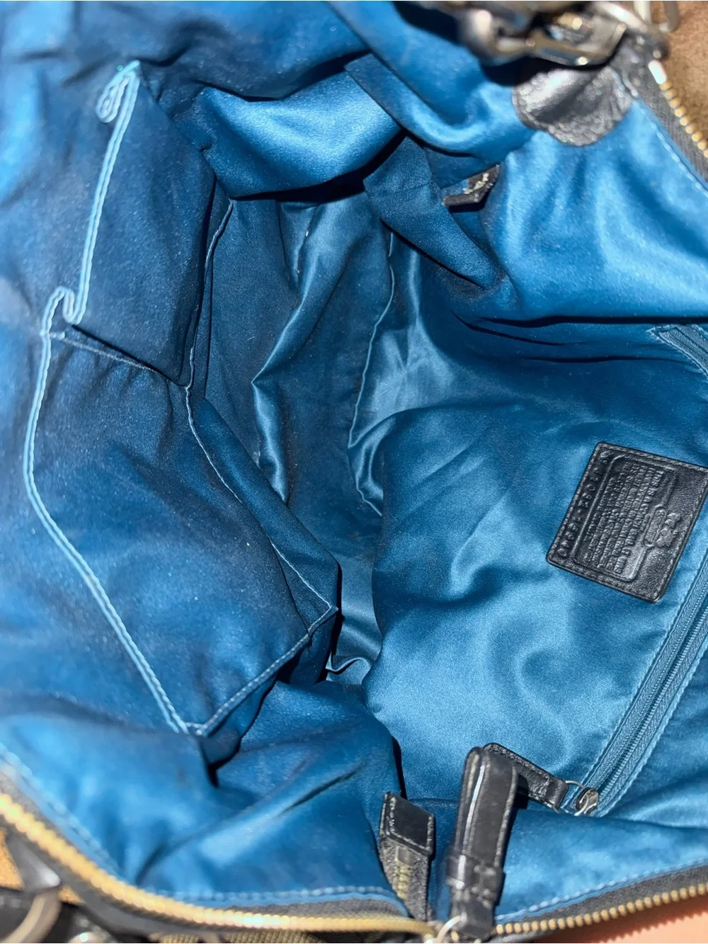 Coach satchel signature