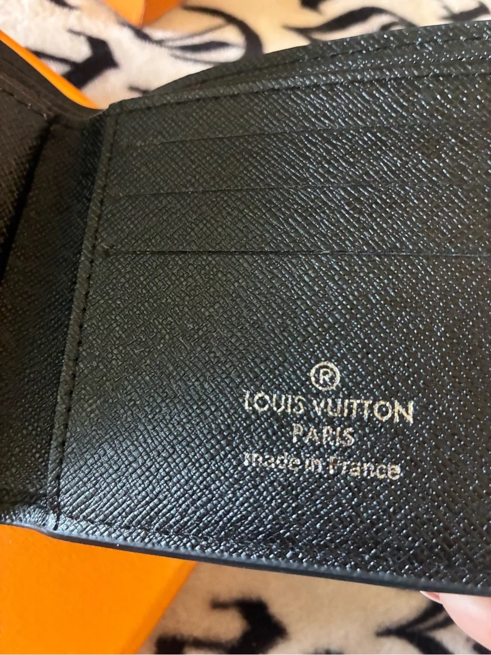 Unlisted￼ compact embossed