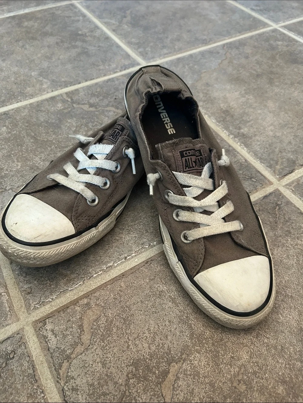 Converse women’s Low-Top Sneakers in Brown with White Trim