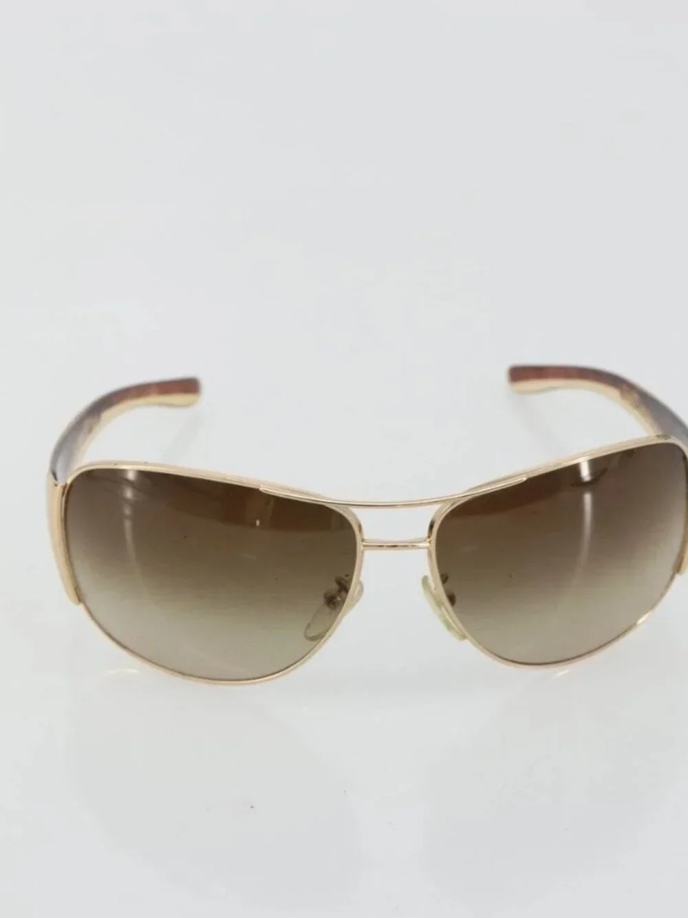 Prada brand	prada color	brown