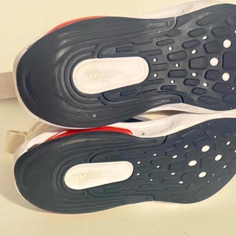 Nike Kids White and Black Sneakers with Pink Accents