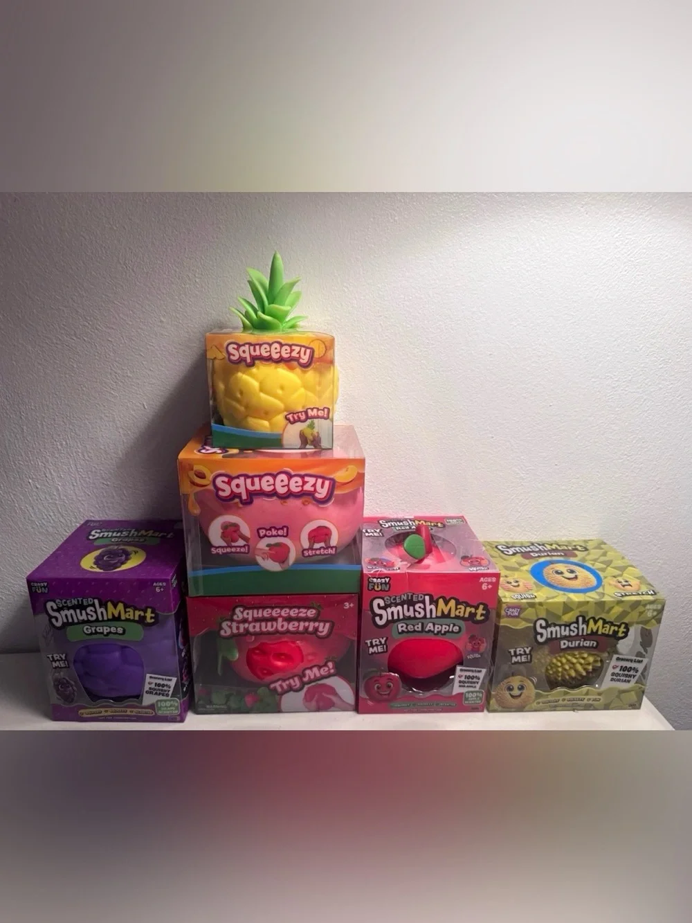 Squeeze Assorted Fruit Squishy Plush Pack - Yellow, Green, Purple, Red