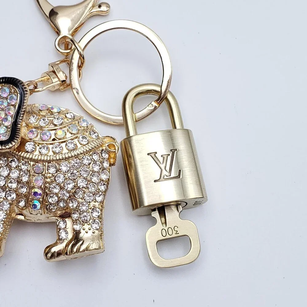 Authentic Louis Vuitton Lock & Key with Unbranded Elephant Charm, Keychain