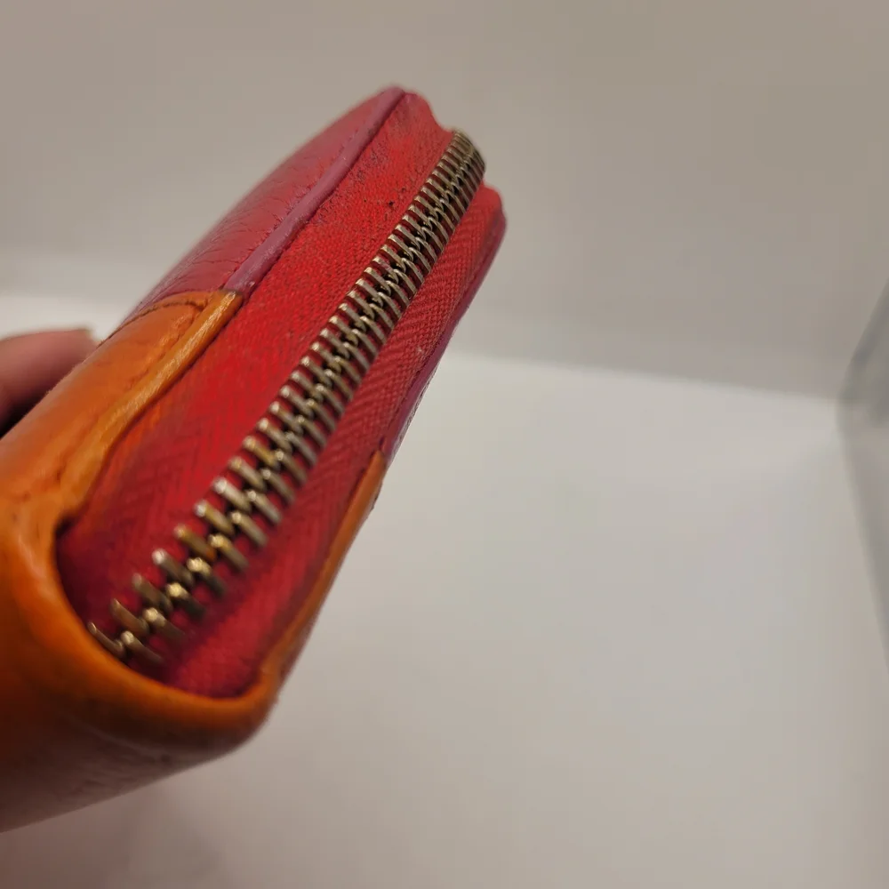 Gucci Red and Orange Leather Wallets