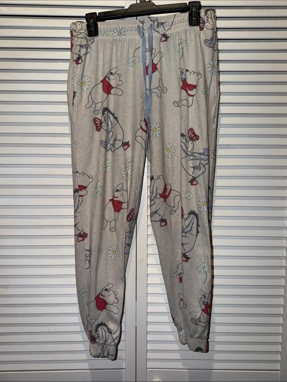 Women's Winnie the Pooh Beige Pajama Joggers with Red Accents