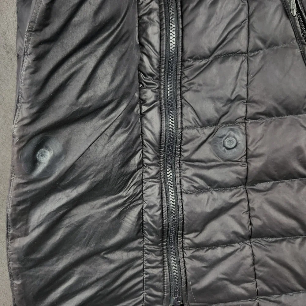 The North Face magnetic button