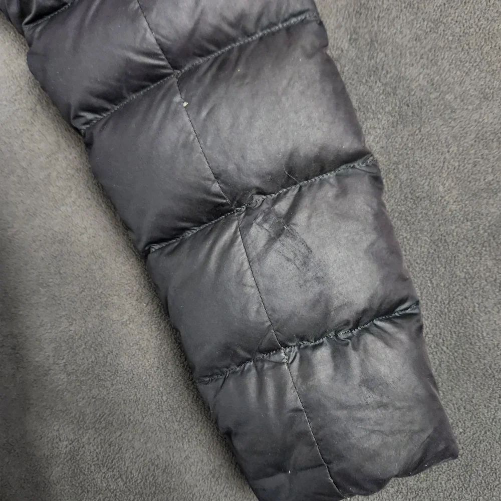 The North Face magnetic button