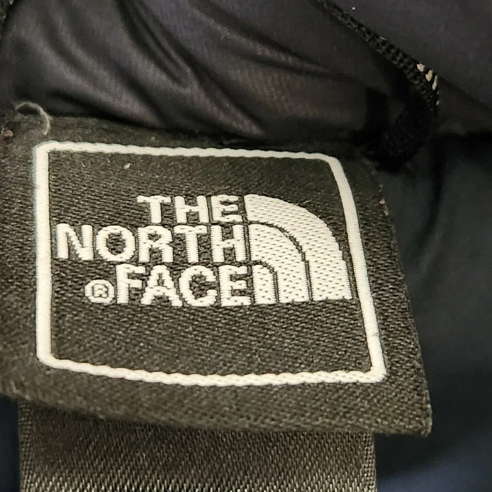The North Face magnetic button