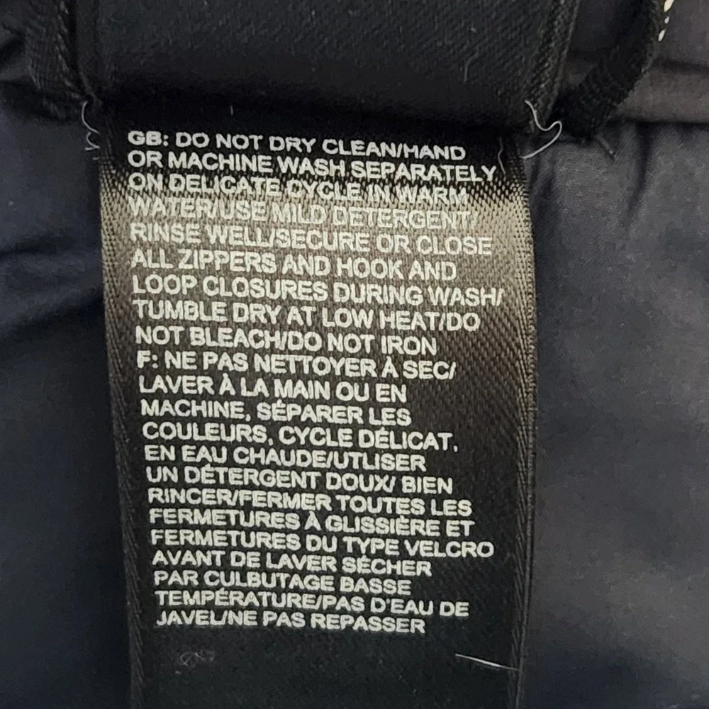 The North Face magnetic button