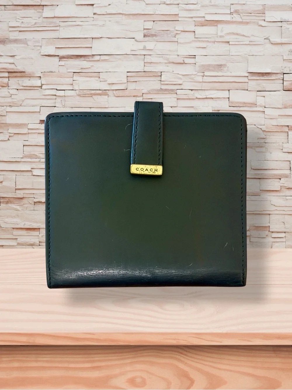 Coach Black Leather Unisex Bi-Fold Wallet with Gold Accent