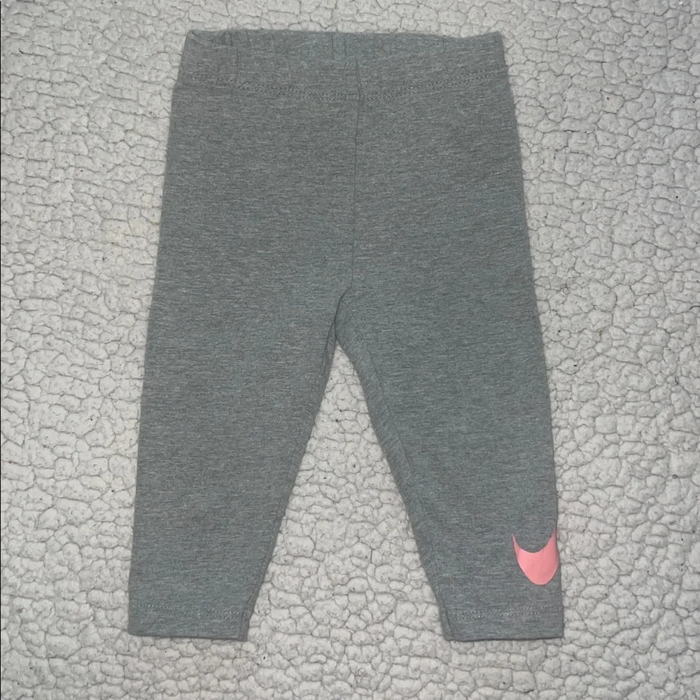 Nike white onesie