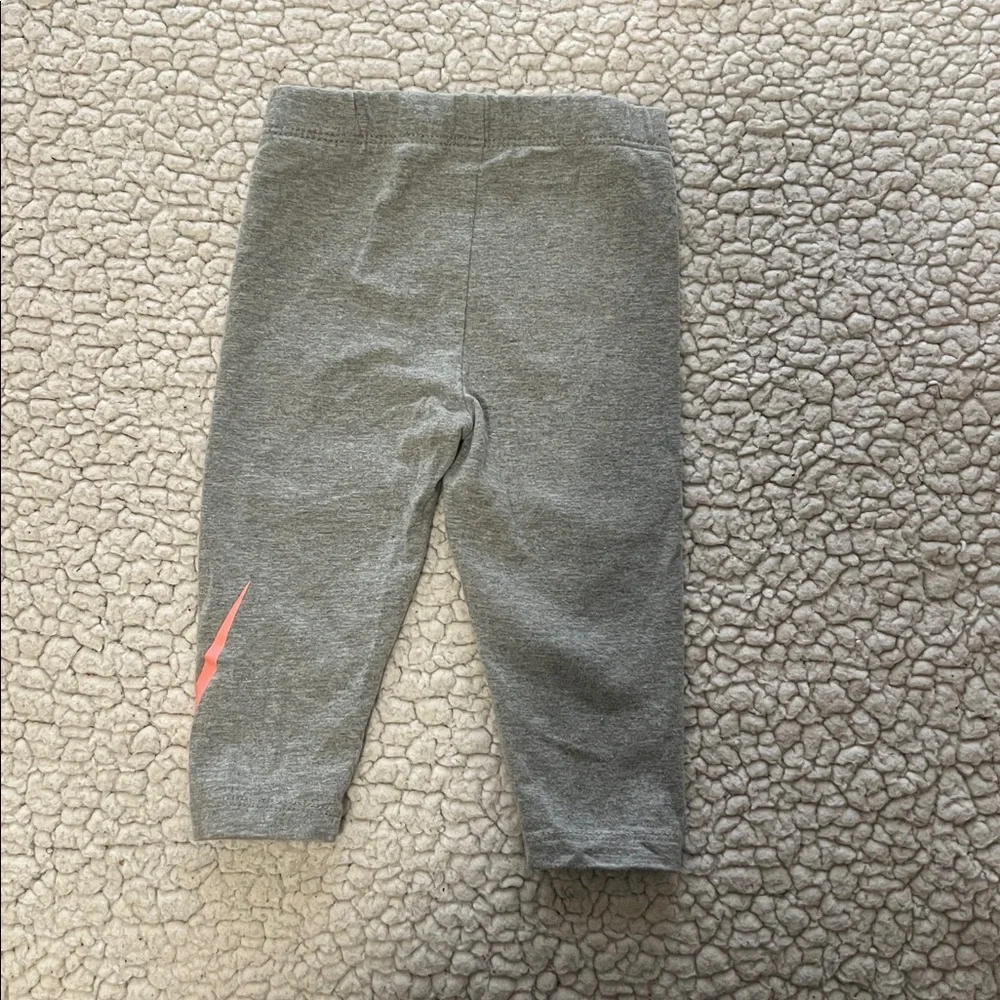 Nike white onesie