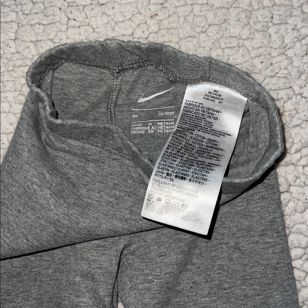 Nike white onesie