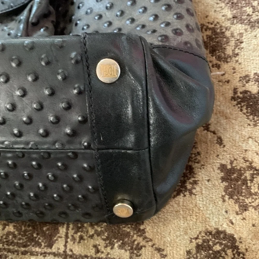 Escada scuffs light wear
