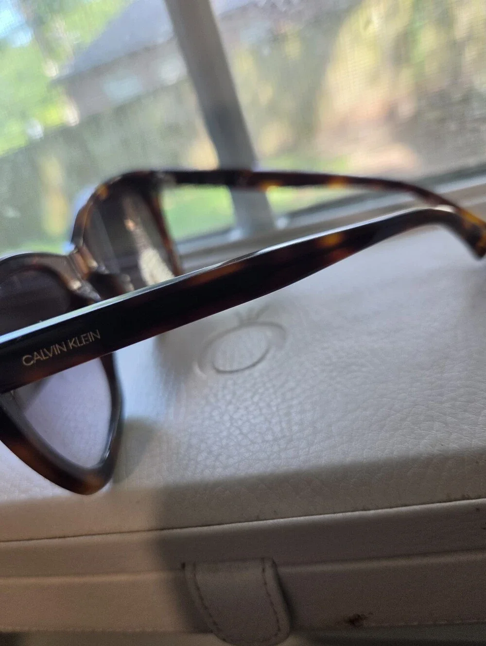 Calvin Klein chic tortoiseshell