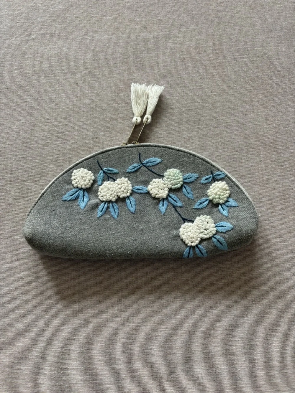 Grey embroidered floral half moon whimsical coquette clutch bag.