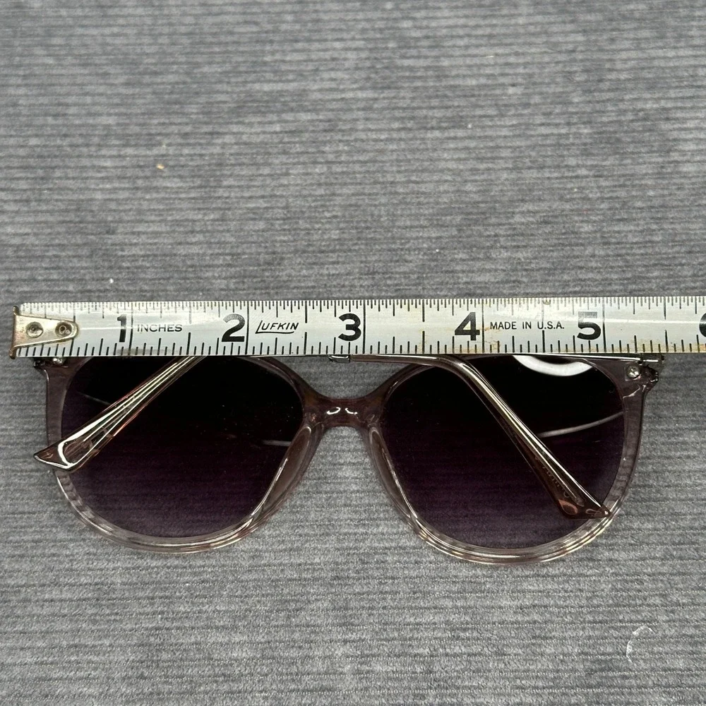 Revlon sunglasses featuring