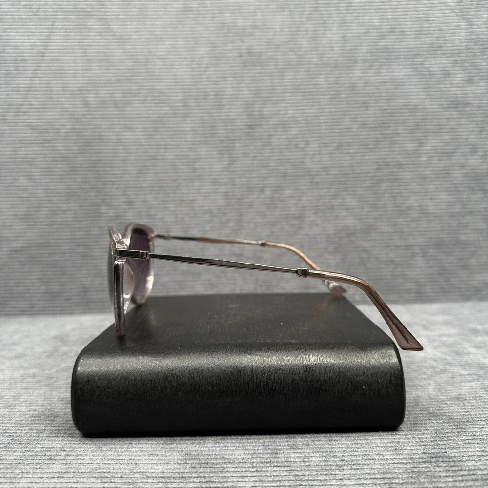 Revlon sunglasses featuring