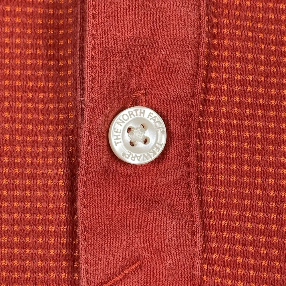 The North Face shirt has