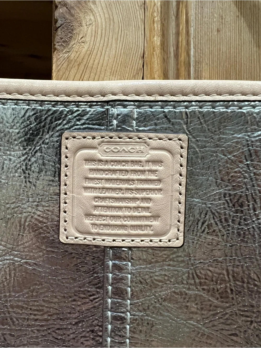 Coach wristlet metallic