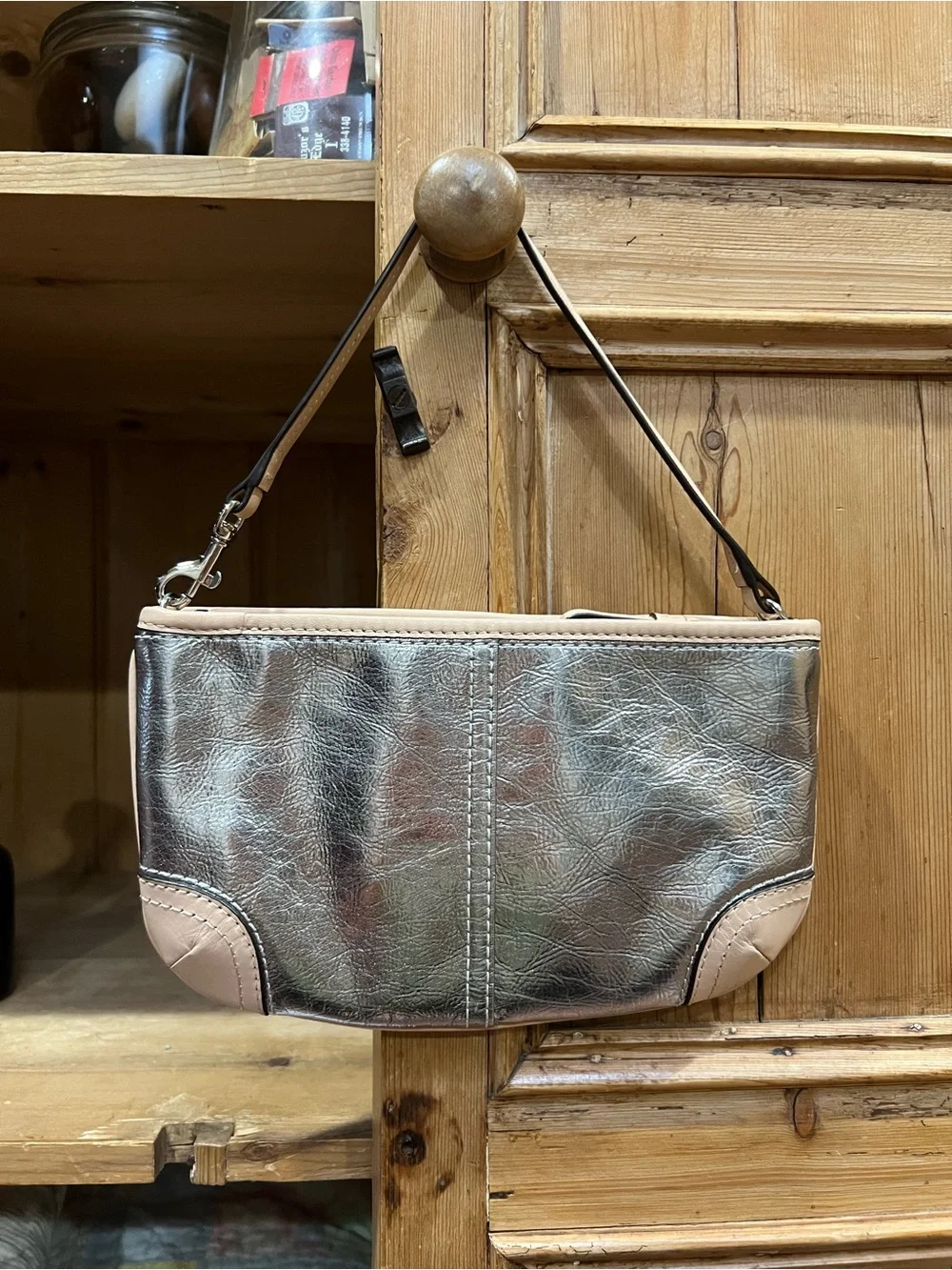 Coach wristlet metallic
