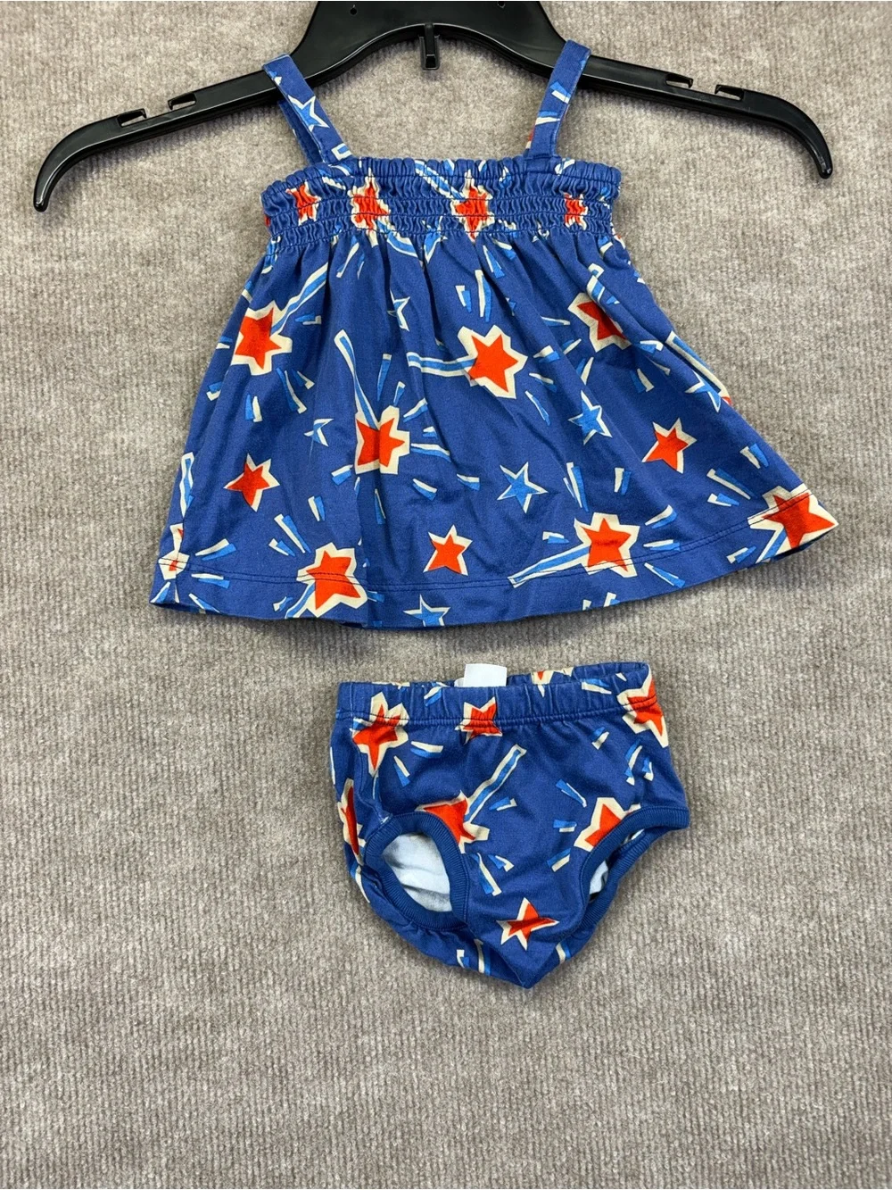 Hanna Andersson blue smocked dress featuring a red and blue 