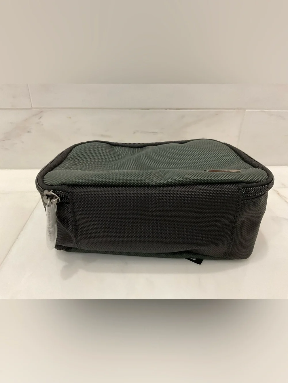 Tumi up sale