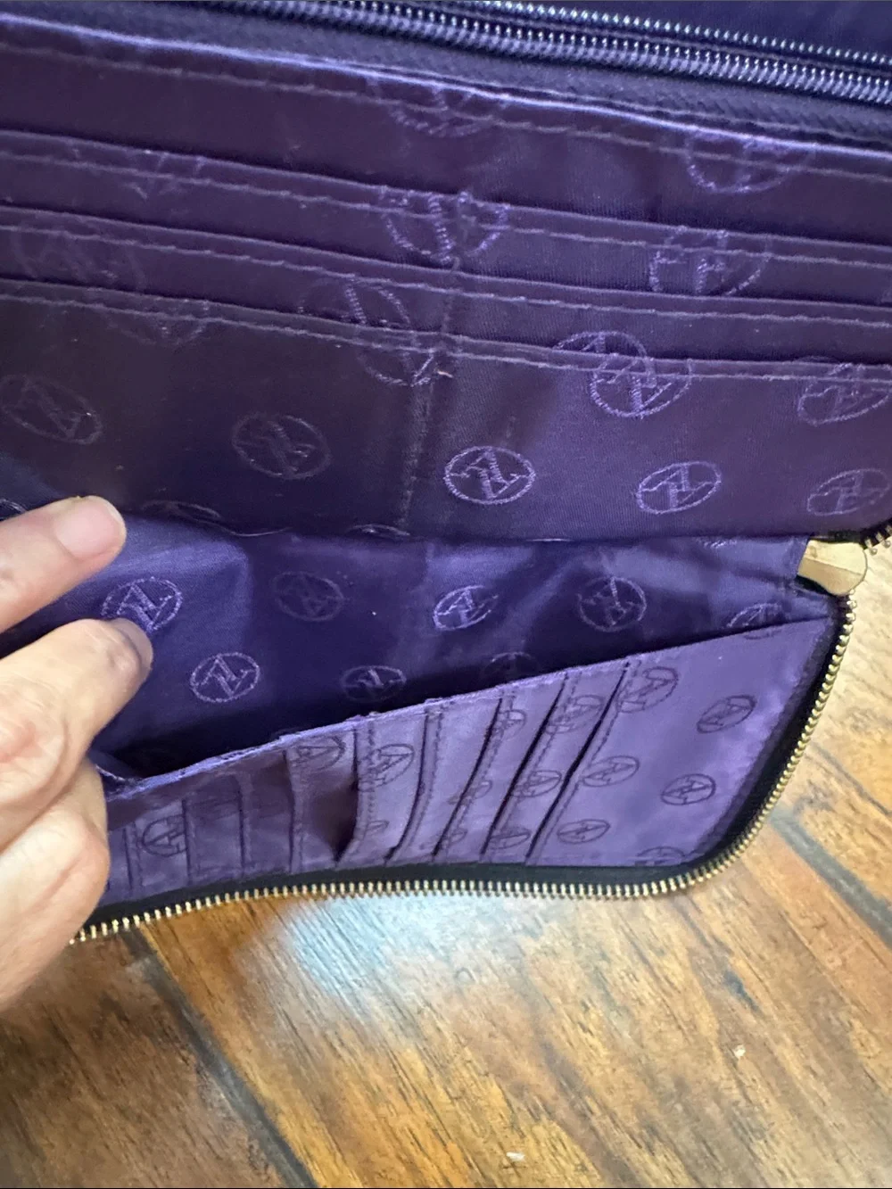 Adrienne Vittadini Black Zip Around Wallet Purple Interior Pebbled