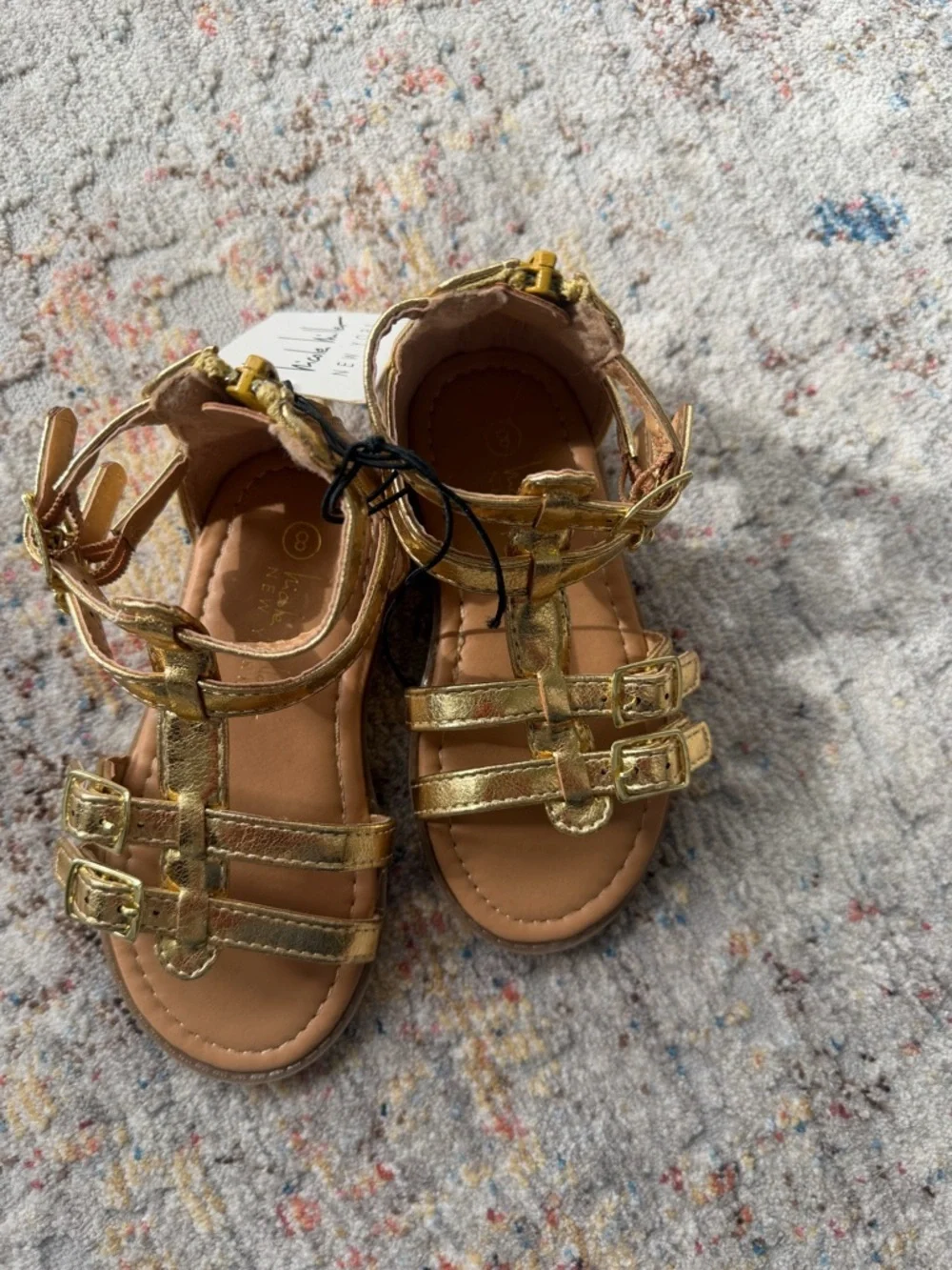Nicole Miller gold gladiator