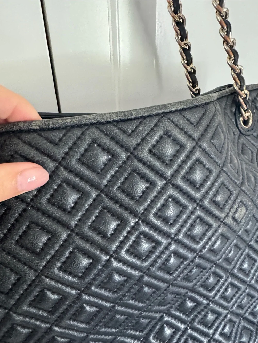 Tory Burch essentials carefully