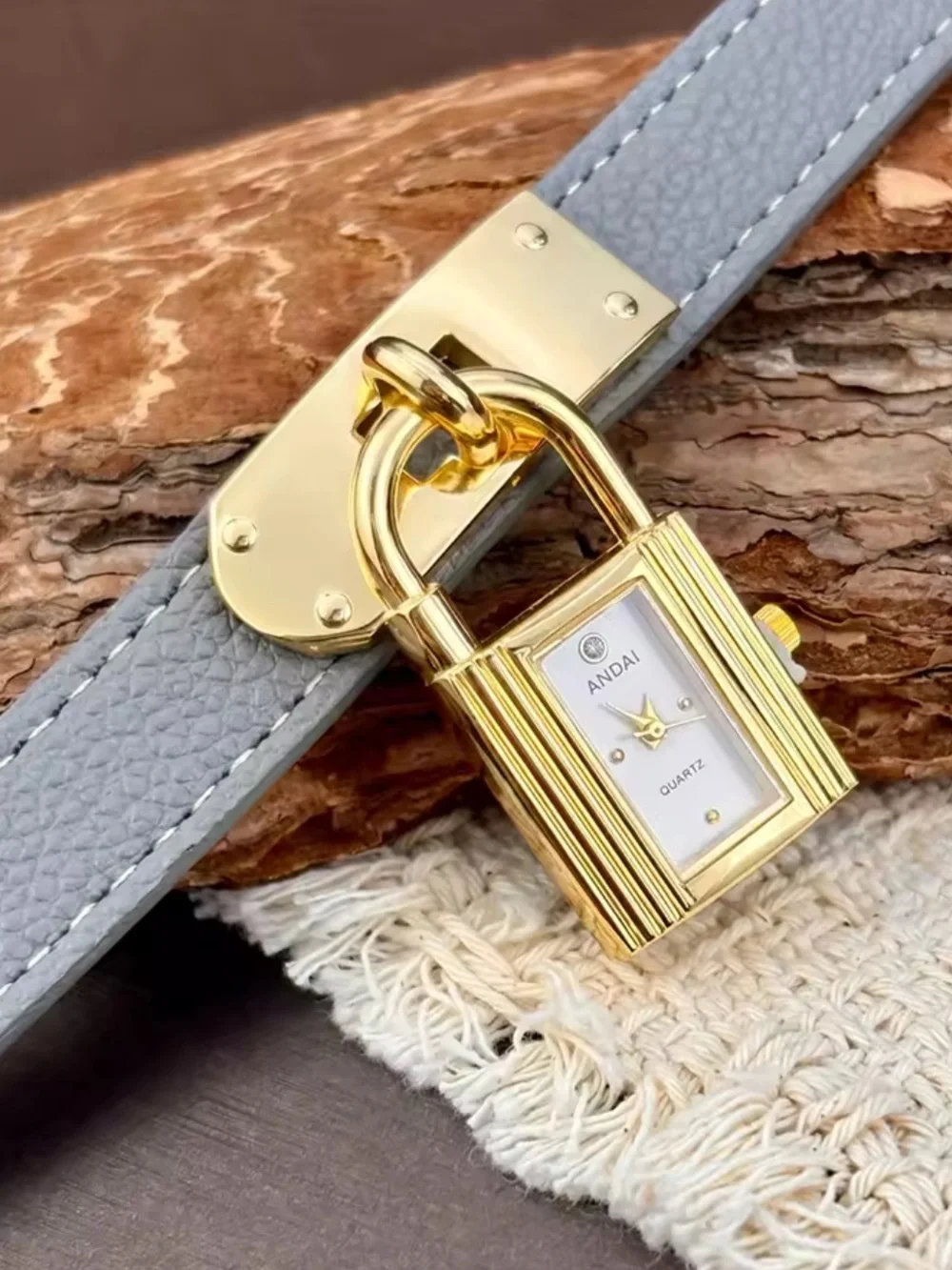 ANBAI Gold Padlock Watch Charm on Light Gray Strap
