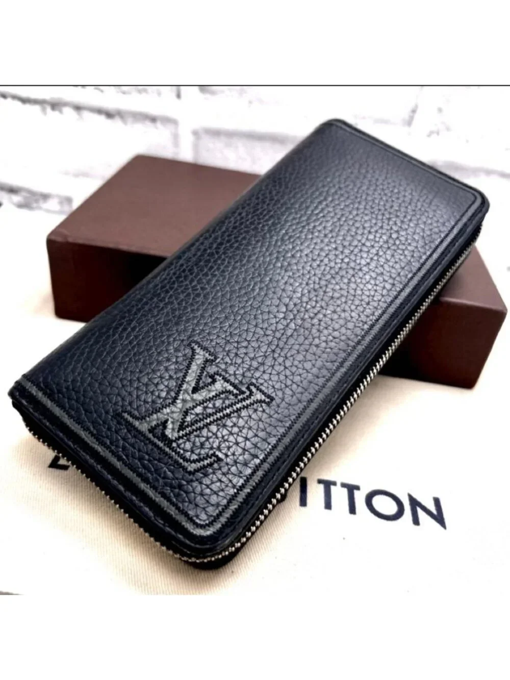 Louis Vuitton Taurillon Leather Vertical Zippy Wallet