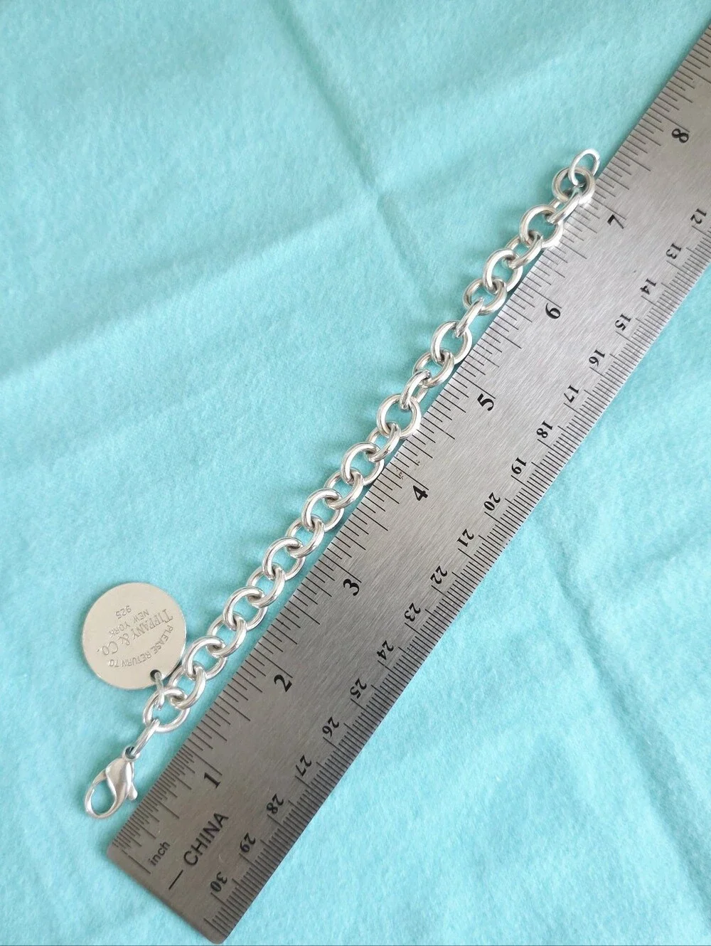 Tiffany & Co. round tag
