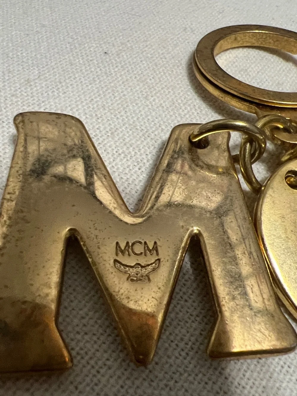 MCM gold tone